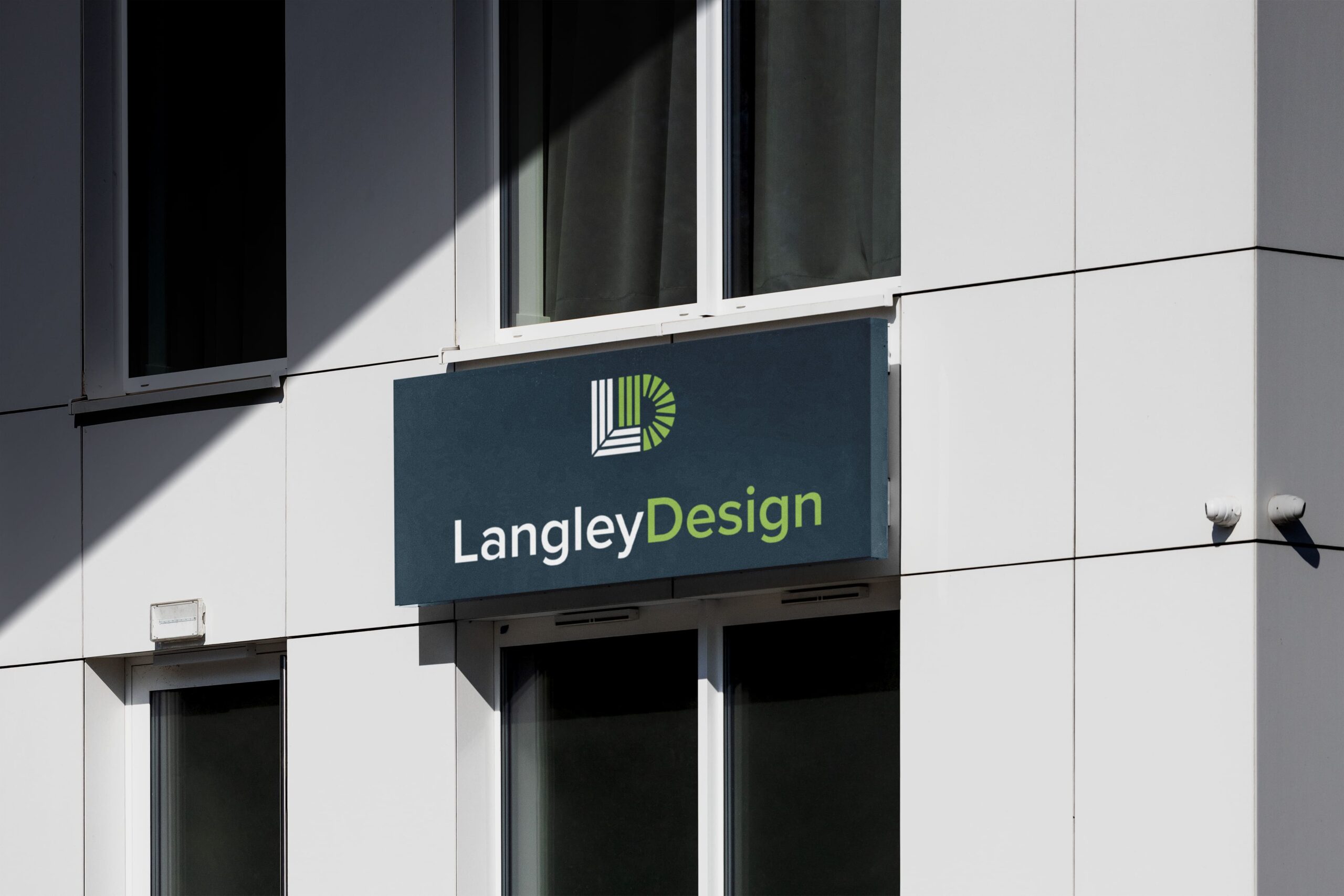 Langley Design logo as a large sign on a building
