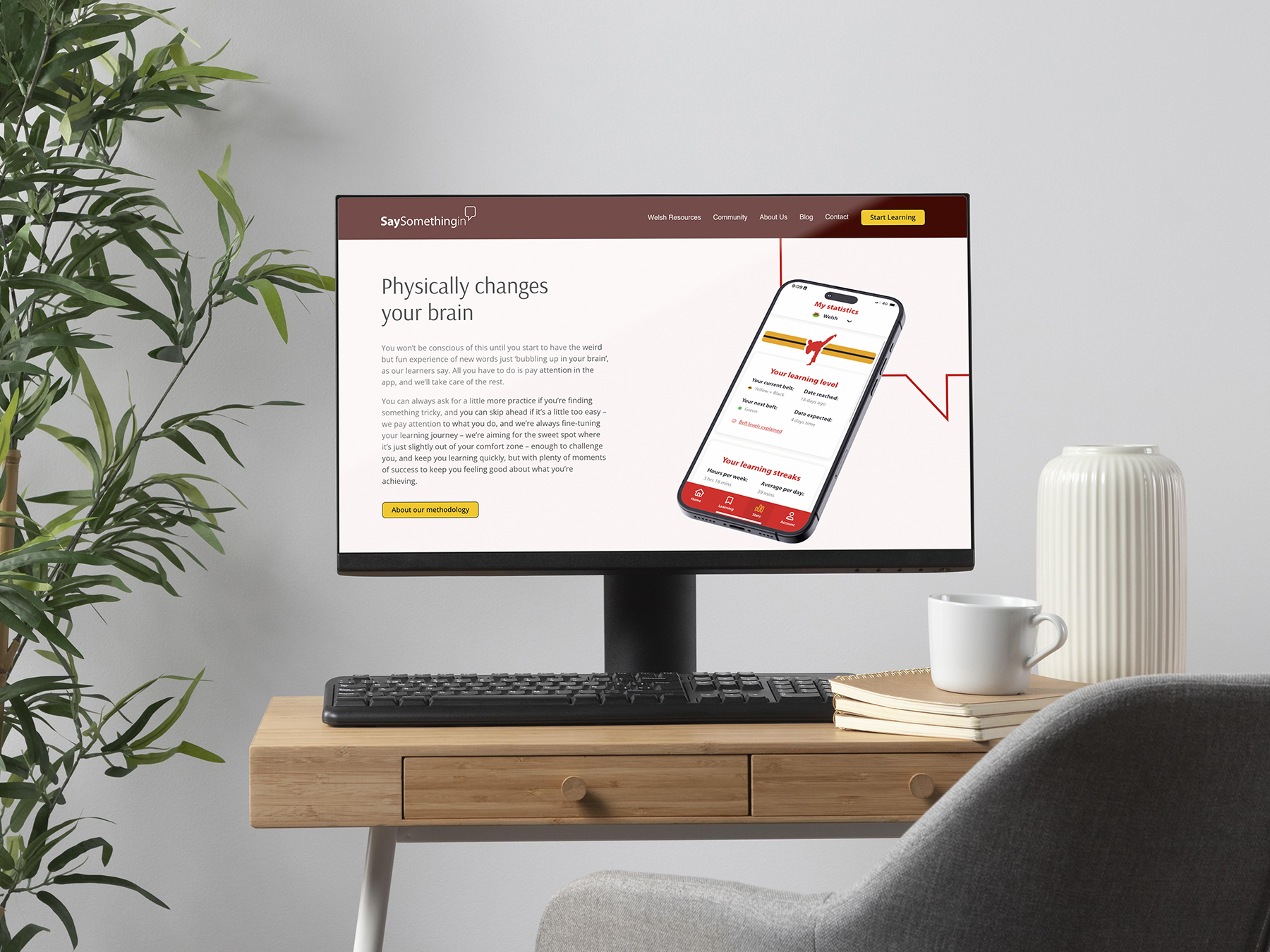 Saysomethingin website on desktop monitor